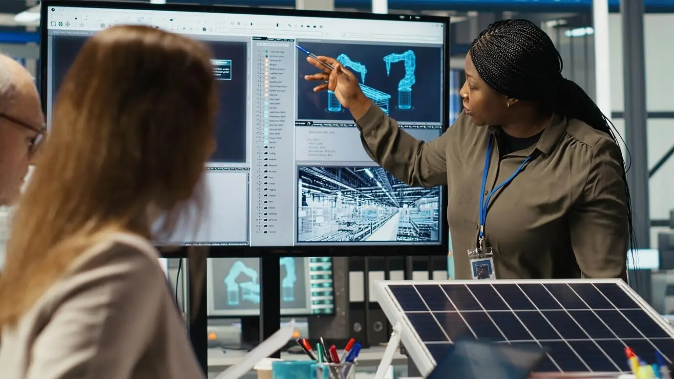 An engineering team in a photovoltaic plant improving solar cell efficiency